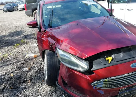 2015 Ford Focus Titanium from USA, damaged, VIN 1FADP3N27FL292462